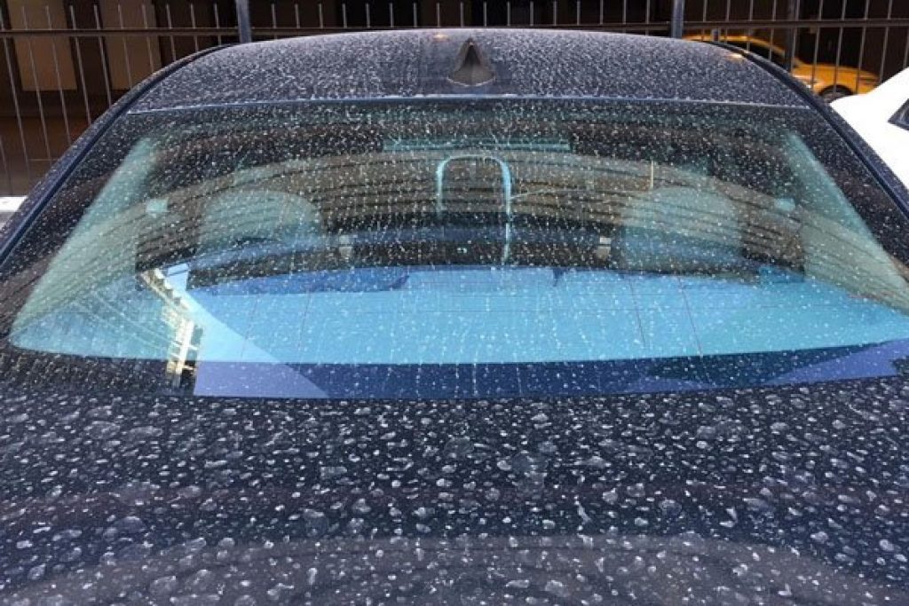 Picture of a dirty car after rainfall.