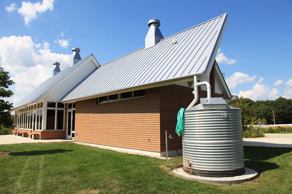 Here you can see an example of a rainwater tank attached to piping that collects rainwater from roof gutters.