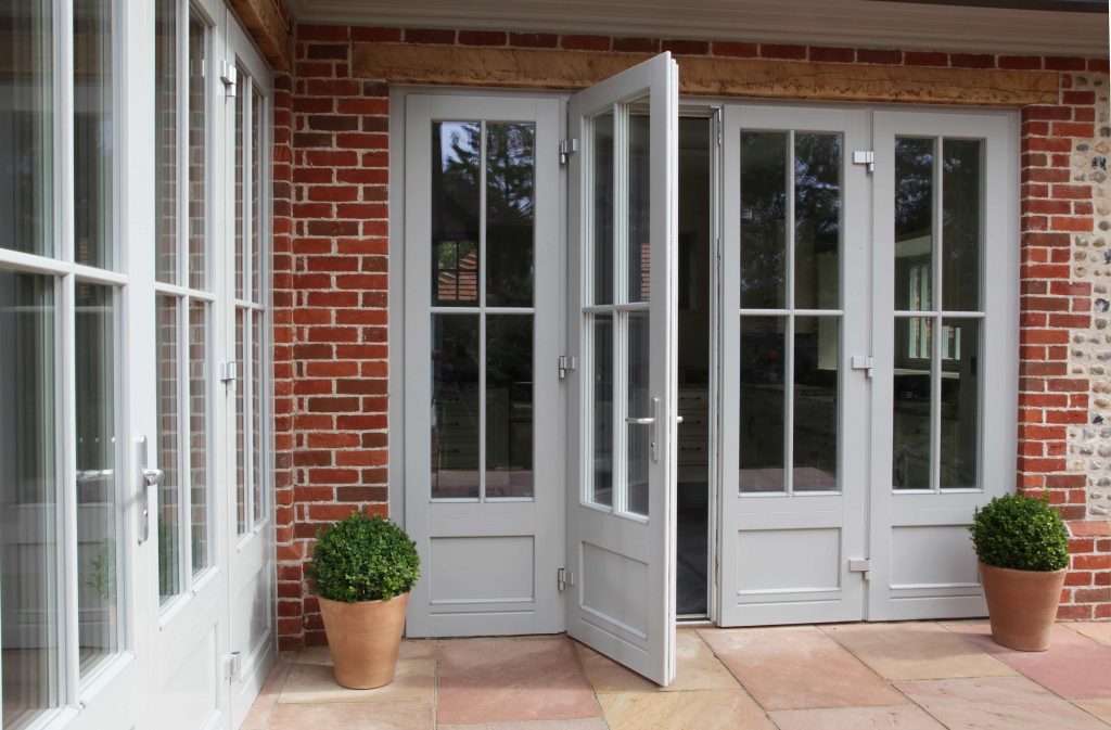 Triple glazed timber French doors.