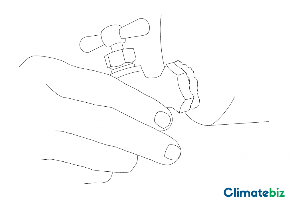 The tap, sealant and PVC cap of a DIY solar shower guide.