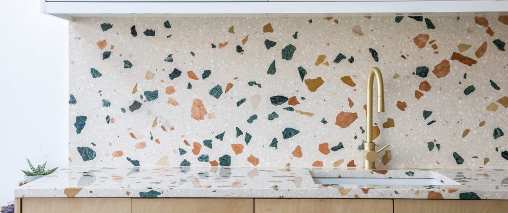 Terrazzo generally consists of larger pieces of marble or quartz set into a binder.