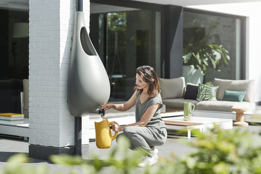 This beautiful product design combines a rainwater barrel and a downpipe into one.