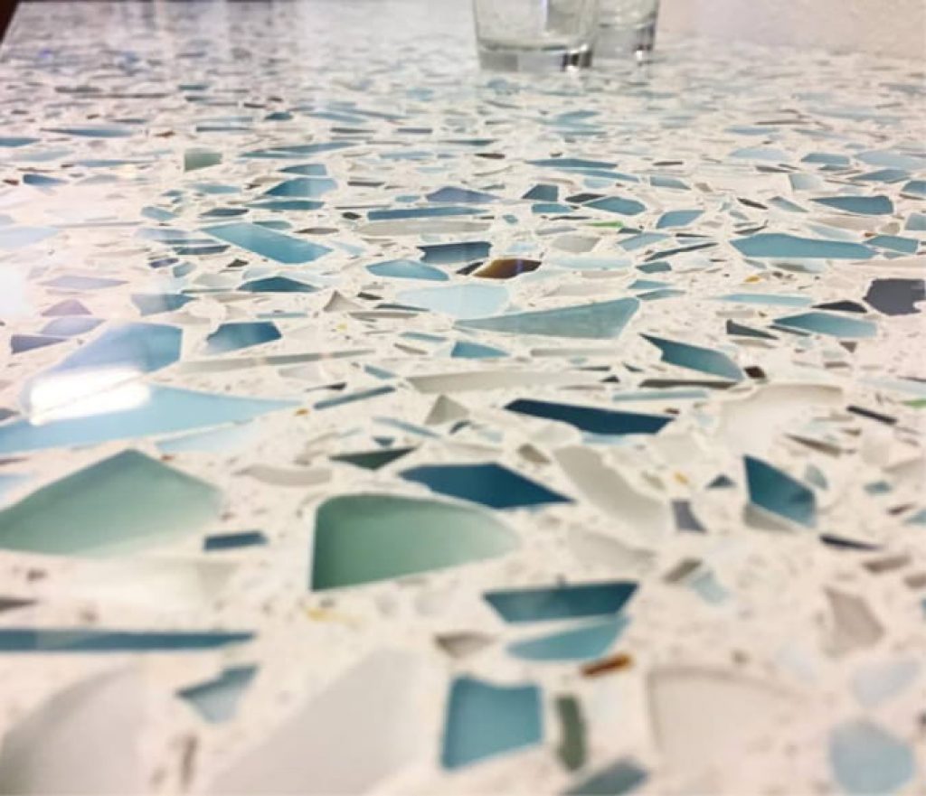 Recycled glass can be used to make mosaic-like countertops.