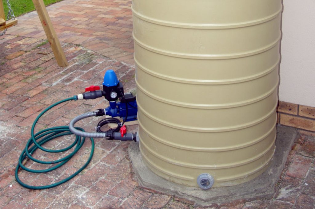 Connect a pump to your rainwater storage tank using ball valves and flexi-pipes — DIY rainwater system.
