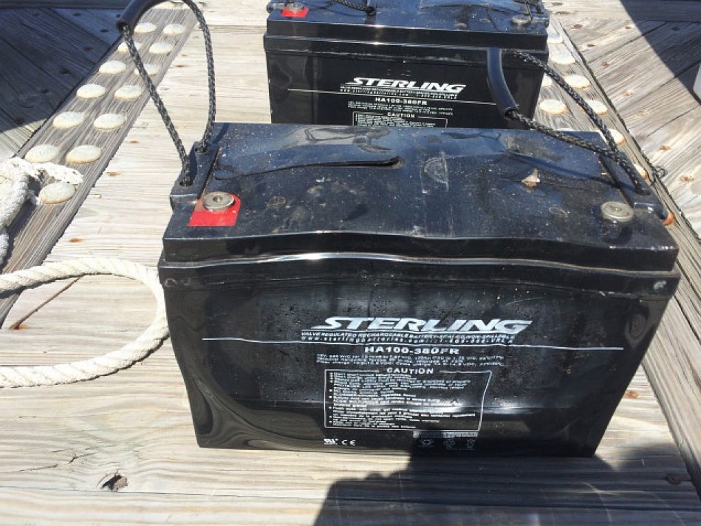 Storing soalr batteries outside may damage the battery. The image shows a swollen and melted lead acid battery.