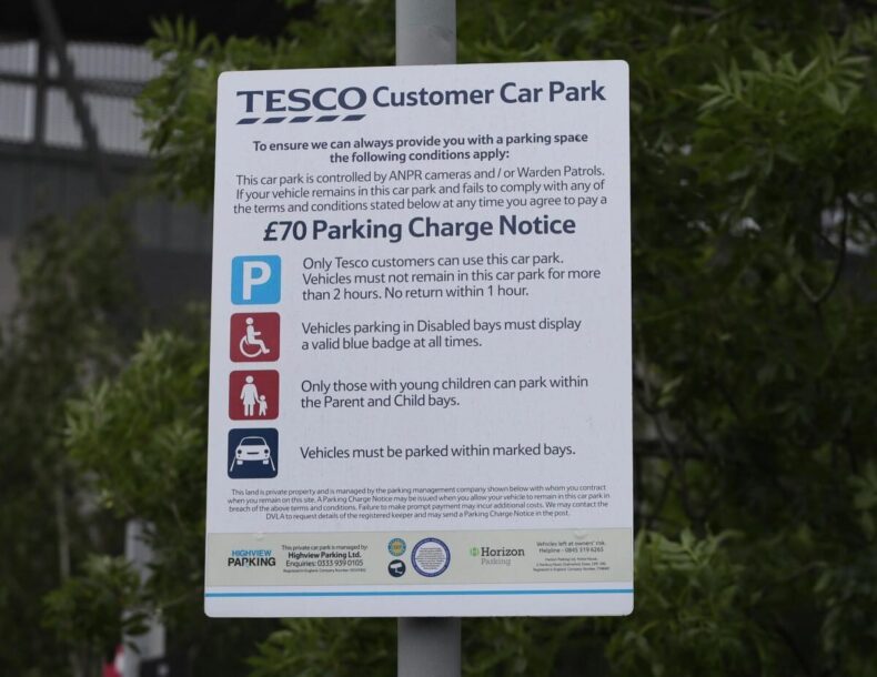 Charge car at Tesco.