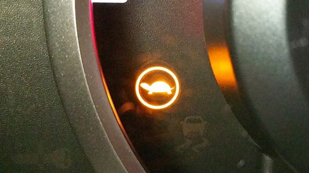 The turtle warning light in the Nissan Leaf dashboard warns of low power and entering crawl mode. 