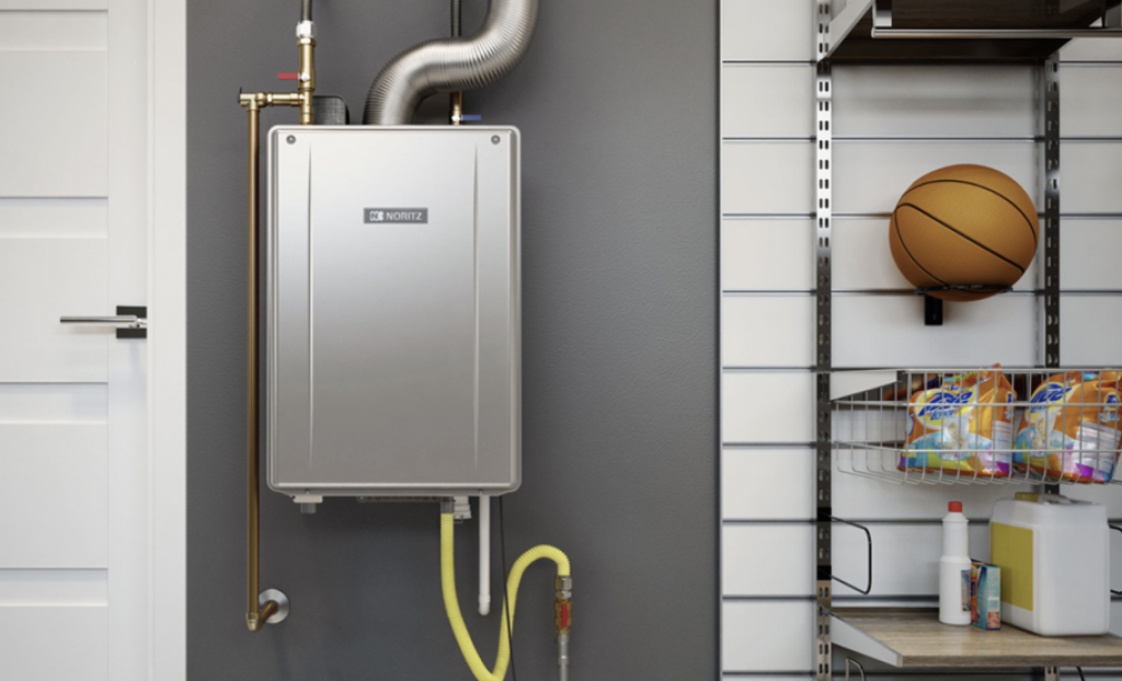 A tankless water heater in a garage.