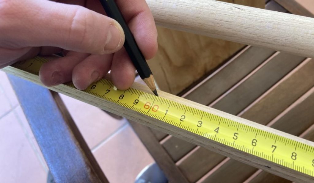 Taking measurements — DIY solar light project.