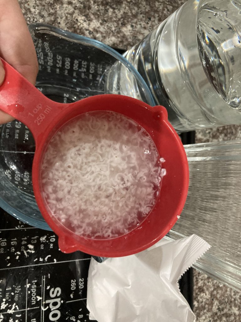 Soap flakes dissolving in water — DIY home cleaner.