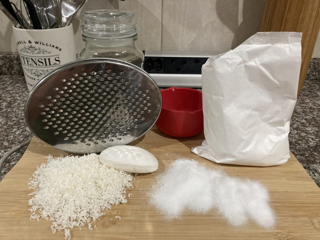 Mixing baking soda and soap flakes makes a great laundry detergent — DIY home cleaner.