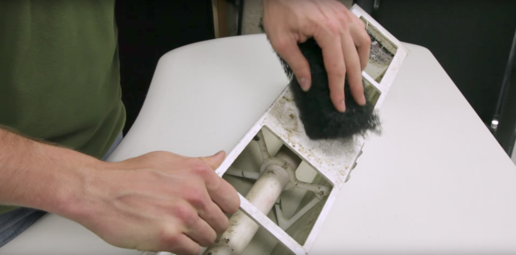 Cleaning a hydroponic system.