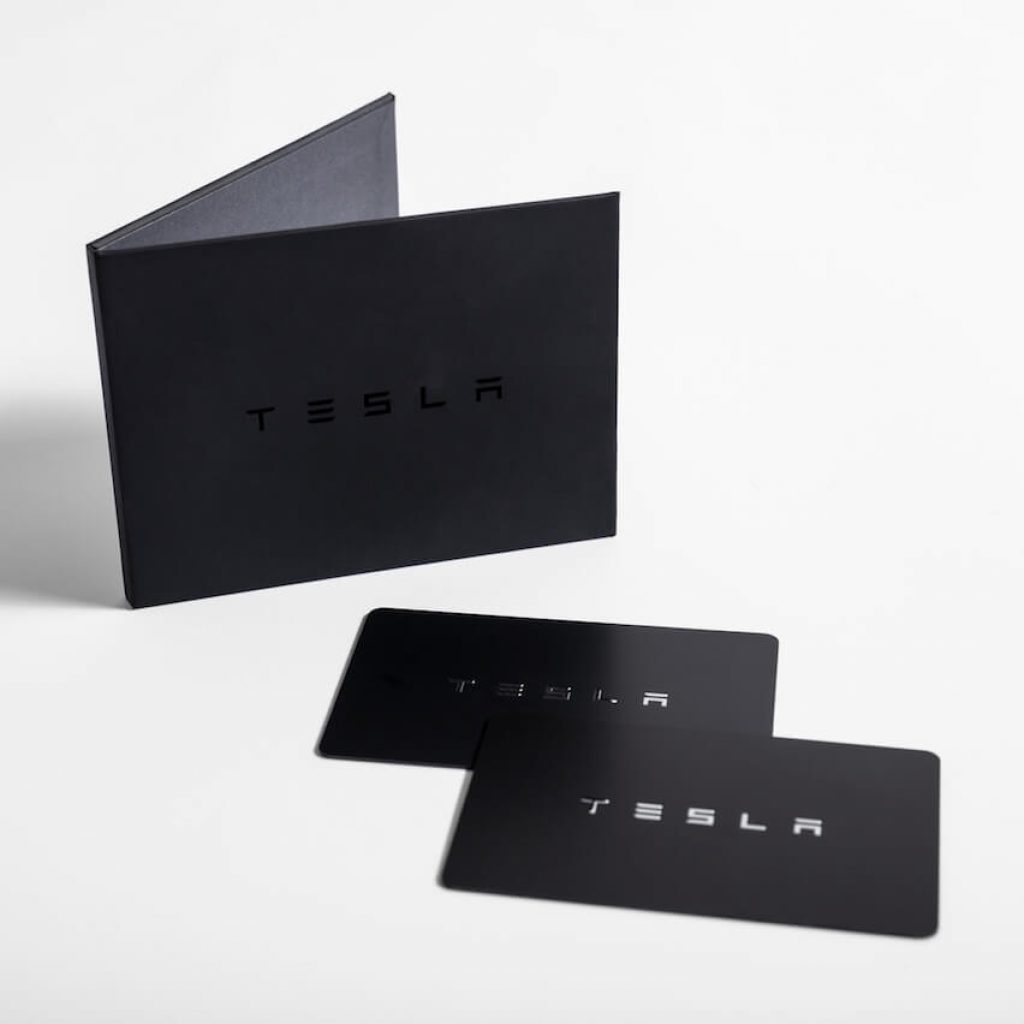 You can expect two key cards and a wallet when purchasing a replacement card from Tesla. 