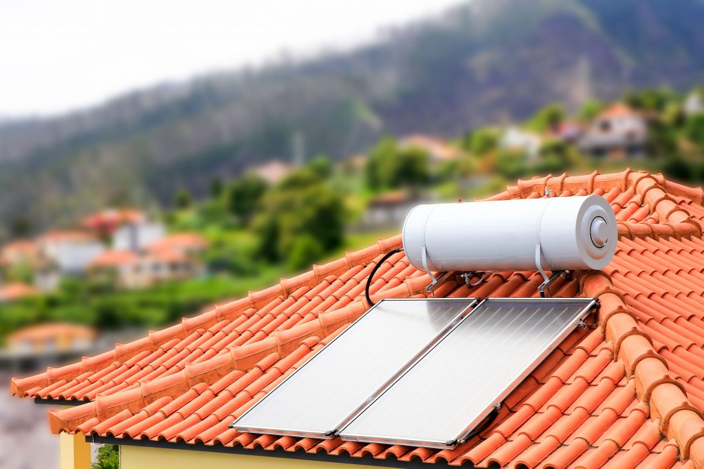 Solar water heaters can be installed on the slope of your roof or propped up by a stand