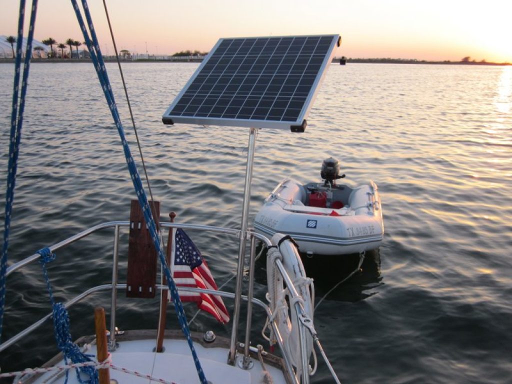 A rigid solar panel on a pole mount on a boat