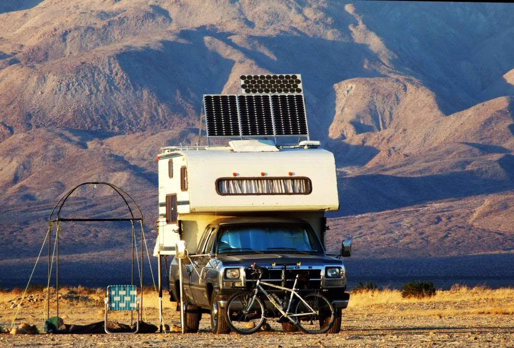 Full RV setup with adjustable tilt method solar panels.