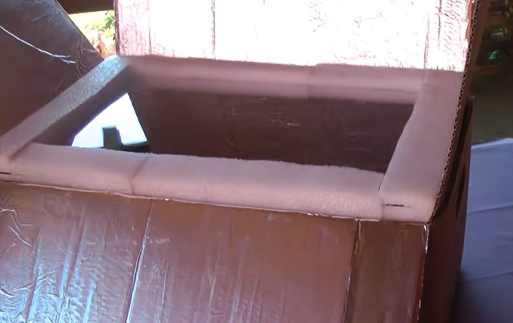 Glass used to cover the top of a DIY solar oven.
